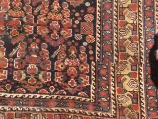 As found: 1900's to 1920's Persian Khamseh in good condition measuring 7'5"x 4'7", three inches difference in width from one end to the other (4'6" to 4'9"), pile is low and even,  ...