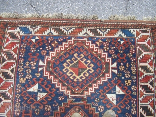 Here's a nice, turn of the century Kazak (1890's?), size is 50"x76", has foundation showing in several places, but not difficult for your repair person to tackle.  Has all its guard  ...