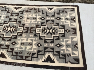 The Rug Pickers find as found: A vintage regional Navajo measuring 4'10"x 7'3", which is lovely in every way except for two or three tiny less than dime size spots that won't  ...