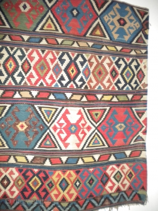 Like the radiohead song "No Surprises", there are no surprises with this 56"x54" inch ancient Shah-Savan kilim fragment.  Even in this state, it is gorgeous.  I have taken numerous pictures  ...