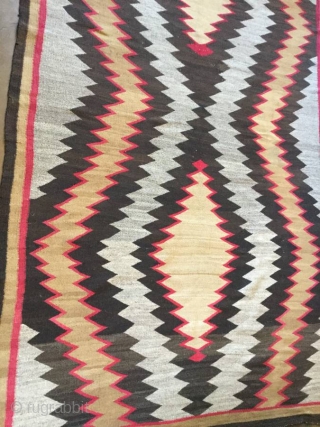 For sale is a very handsome Old Navajo rug measuring 5'7"X 9'4" in great condition.  Thanks for looking.              