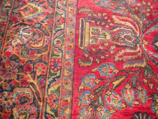 Fresh from an estate as found: A 1920's Persian sarouq, size is 11'10"x8'10".  It has good wool, good weave, good colors, but unfortunately, has wear almost down to the foundation in  ...