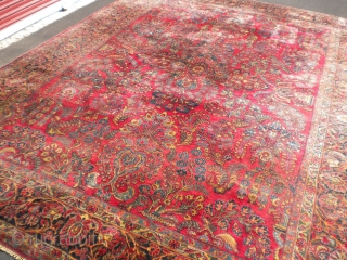 Fresh from an estate as found: A 1920's Persian sarouq, size is 11'10"x8'10".  It has good wool, good weave, good colors, but unfortunately, has wear almost down to the foundation in  ...