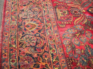 Fresh from an estate as found: A 1920's Persian sarouq, size is 11'10"x8'10".  It has good wool, good weave, good colors, but unfortunately, has wear almost down to the foundation in  ...