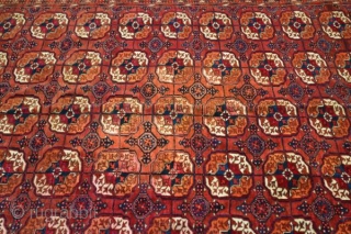 As found: An early 20th century Turkoman carpet measuring 7'5"x 11'4", light even wear, couple of old repairs that are hard to notice, and an area with some discoloration.  Thanks for  ...
