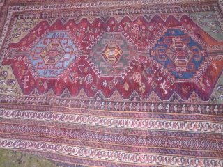 As found: An early 20th century Tribal rug measuring 5'x 7' in good condition, light even wear.  Thanks for looking.            