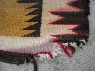 As found: An early 20th century Navajo rug measuring 4'5"x 8'3" with problems that you can see in the pictures.  I have removed the circular stain in the rug since posting  ...