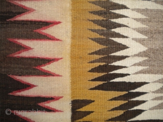 As found: An early 20th century Navajo rug measuring 4'5"x 8'3" with problems that you can see in the pictures.  I have removed the circular stain in the rug since posting  ...