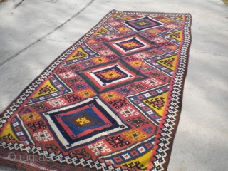 A nice vintage Qashghai Kilim, size is 5'8"x13'3", in great condition.                      