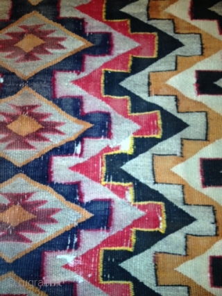 RUG-PICKERS FIND AS FOUND: AN OLD RED MESA NAVAJO WITH DAMAGE.  SOMEBODY IN THE PAST HAS TRIED TO SEW SOMETHING TOGETHER, HAS 7 HOLES ALONG ONE END, THE OTHER END JUST  ...