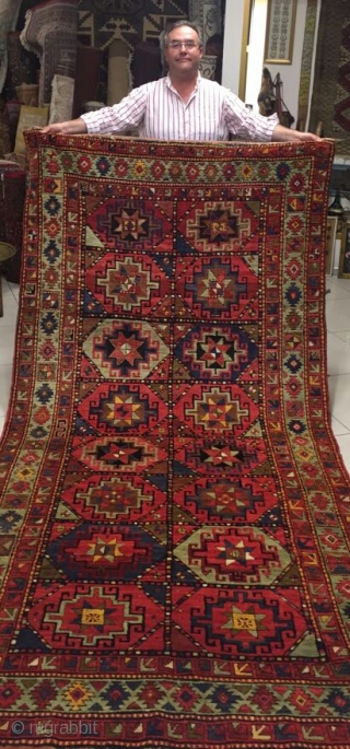 A 130 year old Mogan kazak carpet in very good condition.Mostly used as a wall hanging. Vegetables dyes vivid color. 
130×280            