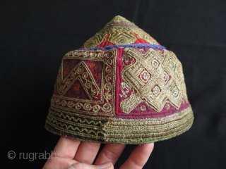 Afghan Metallic and Silk Embroidered Hat. Fine silk and strong metallic running and couching stitch embroidery. Size: 5.9" - 15 cm high and 7.1" - 18 cm wide in diameters.   