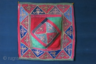 Kirgiz Talismanic wall hanging  - Mirror cover. made with wool trade cloth and leathers with silk border stitching. One of the nice ones survived from 19th century. Size : 22.5" X  ...