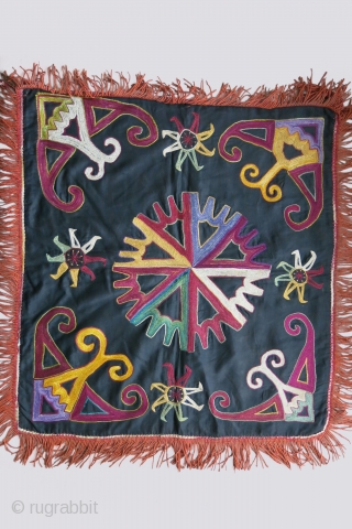 Uzbekistan Lakai - Kungrat tribal wall hanging. silk embroidery on fine cotton with dyed cotton tassles. Circa 1900 or ealier. size : 21" X 19.5" - 53 cm X 50 cm  