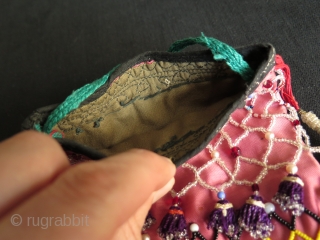 Uzbekistan small bag. Silk tassels and trade glass beads. Size: height with tassels 9.8" - 25 cm and width 5.5" - 14 cm.          