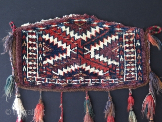 Turkmen small Yomud asmalyk. Great saturated natural colors. Size 10.5 x 19 - 27 cm x 49 cm               