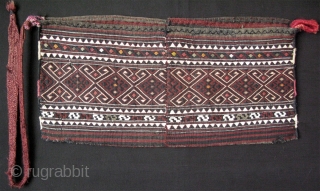 EAST ANATOLIA, Shavak Kurdish tribe baby carrier. Very similar to the one in John Thompson's Carpet Magic book (last page).Sumak weave with natural colors. circa 1900 - 1920. size: 15" x 31"  ...