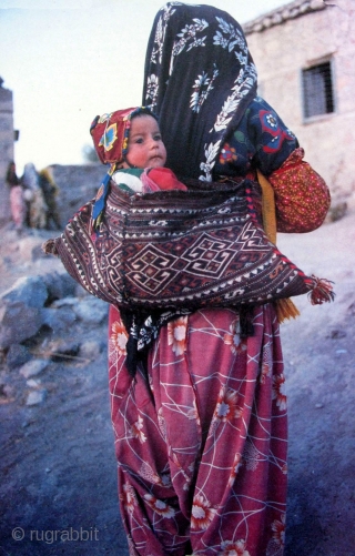 EAST ANATOLIA, Shavak Kurdish tribe baby carrier. Very similar to the one in John Thompson's Carpet Magic book (last page).Sumak weave with natural colors. circa 1900 - 1920. size: 15" x 31"  ...