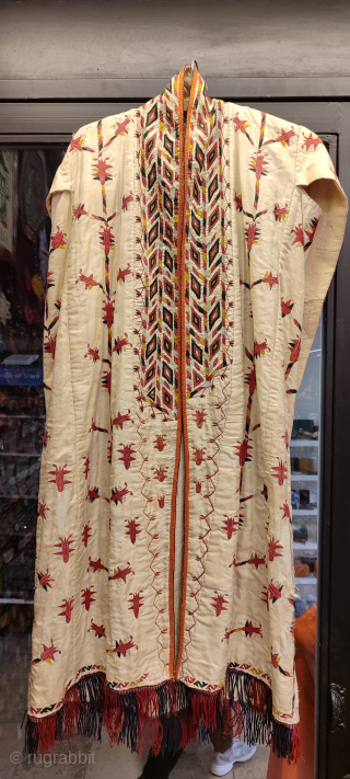 Turkmen vintage white chirpy. Some damages on the white silk background material.                     