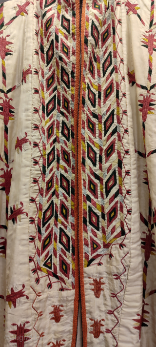 Turkmen vintage white chirpy. Some damages on the white silk background material.                     