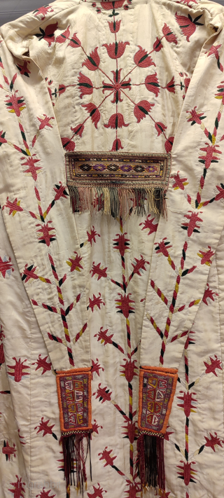 Turkmen vintage white chirpy. Some damages on the white silk background material.                     