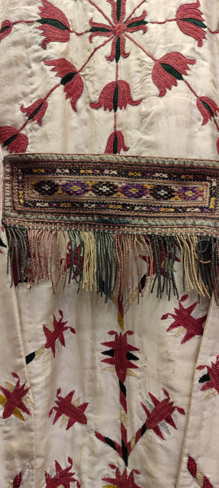 Turkmen vintage white chirpy. Some damages on the white silk background material.                     