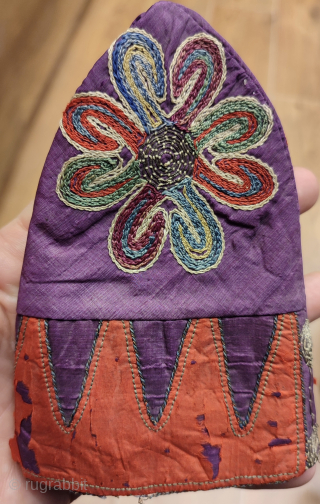 Antique Azerbaijan Silk on Silk Embroidered Childs Skullcap.

Some damages around it, l tried to show as much as possible on images.
Size: height 14.5cm and 41cm in circumference      