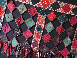 Ersary Turkmen asmalyk - yurt hanging. silk - cotton - wool square pieces put together with fabric tassels. decorated with coins and various buttons. Very good shape. Size : 36" X 25"  ...