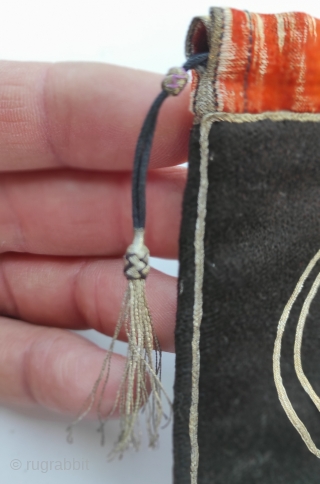 Tobacco pouch. Early 20th century. Village of Kart-dzhurt Batalpashinak district
Kuan region. Silver very fine embroidery on banat, top closer is silk and lining cotton. Size: 14 cm x 17 cm.   