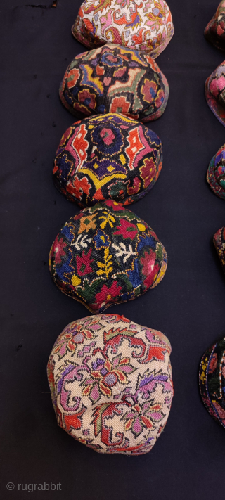 Group of Uzbekistan iroqi silk embroidered hats.