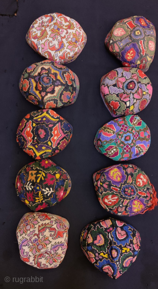 Group of Uzbekistan iroqi silk embroidered hats.