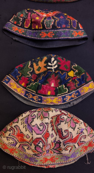 Group of Uzbekistan iroqi silk embroidered hats.