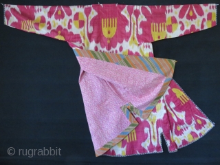 Uzbekistan – Bokhara antique Silk adras Ikat chapan. Saturated yellow and light cocheneal colors are used in a harmony. Lined with printed floral design cotton and cotton facing. It is in pretty  ...