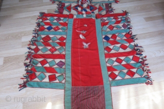 Central Asian - Turkmen ceremonial Camel trapping. made from broadcloth decorated with glass buttons, bird of pray feathers and other talismanic objects. Fairly in tact and good condition. Circa early 20th century,  ...