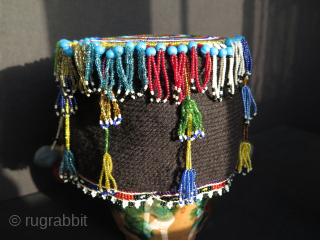 Turkish West Anatolian Bursa Traditional Woman's Beaded Hat. Used on ceremonial days.
In very good condition.

All glass beads except blue color large ones. Decorated with metal pieces.

Size: height 4.3" - 11cm and width  ...