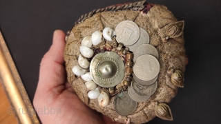 Afghan childs hat with coins.                            