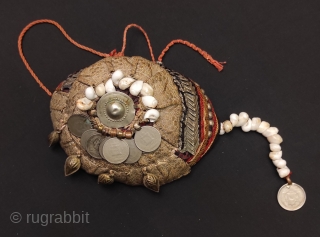 Afghan childs hat with coins.                            