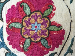 Antique Suzani fragment. Circa 19th Century. Mounted on cotton fabric. Size: 9.8" x 50.6"  25 cm x 129 cm.             