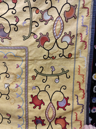 Antique Uzbekistan Suzani Silk Embroidery. 

All silk embroidery on fine cotton. Circa 1920’s.

There are some very small stains in overall.

Size: 118cm x 160cm.          