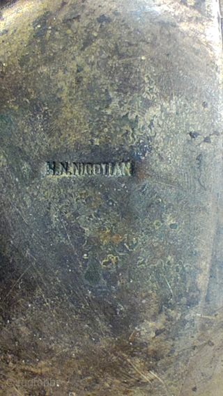 Armenian Copper Candel Holders Signed H.N. Nicotian. 

Sign is on the bottom and written with very small letters. l have tried photographing and added on images.

Size: 28cm high.

Please contact from my email  ...