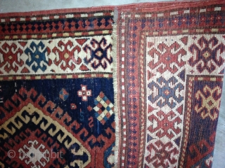 Gorgeous Bordalou Kazak ca 1880s. Classic design and all natural saturated dyes. Mostly full and medium pile with lower pile in the center. A several inch repair of one corner, professional done.  ...