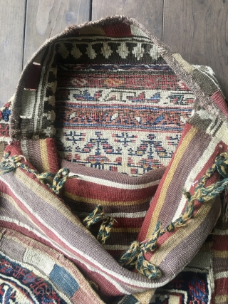 Antique Kurdish double bag in very good condition and in mostly full pile. All natural saturated colors on an ivory field. Some slight moth damage as shown in fourth image. Beautiful colorful  ...