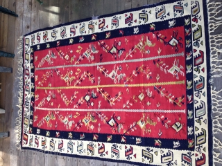 Early 20th C. Balkan kilim. Nice saturated natural colors. Some small repairs as
shown in photos. Size 52X75in./132X190cm. Washed. Buyer pays shipping.            