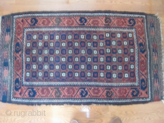 Late 19th C. Baluch rug with unusual star/lattice field design and curled-leaf border. Good pile in borders but lower in field. One old repair can be seen in second image. Good natural  ...