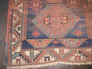 Bordjelou Kazak dated 1320 (1902) worn evenly but complete except one end missing about one inch. Original selvedges.Hand washed. 5'8" X 3'1"
           