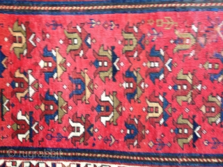 Antique Kuba rug, dated 1314/1896-7. All organic colors. Wonderful well-balanced palette with small tulips in an insect red field. Some limited areas of low pile and wear, otherwise good low to medium  ...