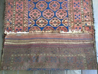 Baluch rug, ca 1900. Retains original length kilim ends with only slight damage. Medium pile throughout with one tiny hole and one spot of fold wear easily repaired. an abrash seen in  ...