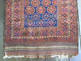 Baluch rug, ca 1900. Retains original length kilim ends with only slight damage. Medium pile throughout with one tiny hole and one spot of fold wear easily repaired. an abrash seen in  ...