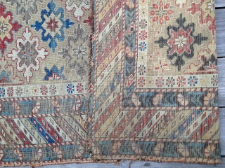 Early Shirvan snowflake design rug, ca 1870. Good natural colors, very low evenly worn pile. Exceptional palette reflecting good age. Missing outer borders on both ends. Yellow field and good variety of  ...