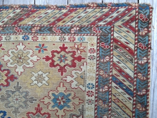 Early Shirvan snowflake design rug, ca 1870. Good natural colors, very low evenly worn pile. Exceptional palette reflecting good age. Missing outer borders on both ends. Yellow field and good variety of  ...